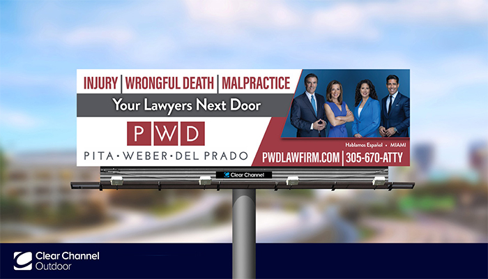 PWD law firm billboard in Miami featuring a Headshot Miami portrait